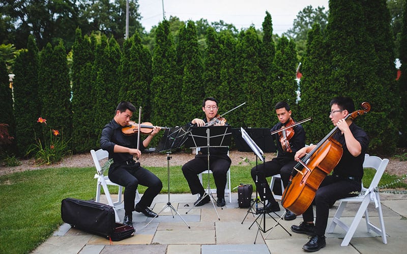Musicians performing in the Goldner Walsh gardens